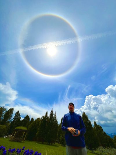 Chris with a solar halo in the background